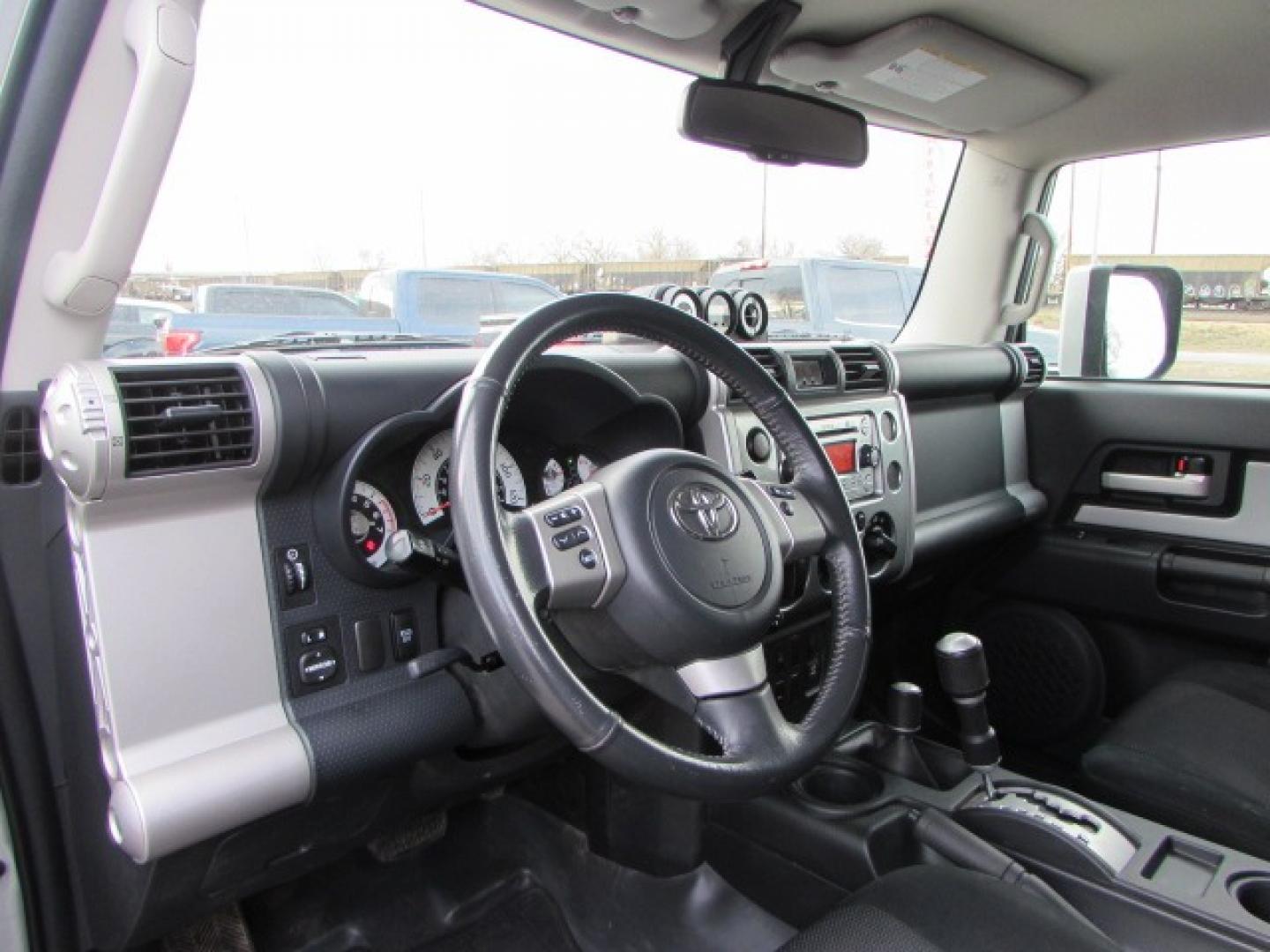 2012 Silver /Gray Toyota FJ Cruiser FJ Cruiser (JTEBU4BF1CK) with an 4.0L V6 engine, 5 speed automatic transmission, located at 4562 State Avenue, Billings, MT, 59101, (406) 896-9833, 45.769516, -108.526772 - Photo#9